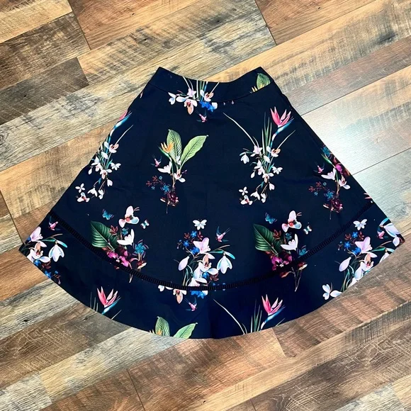 TED BAKER Plio Tropical Oasis Dipped Hem Skirt Navy - Picture 8 of 11